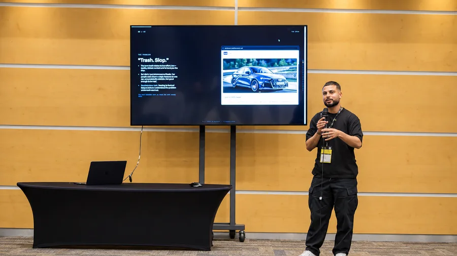 Furquan presenting on stage at Muslim Tech Fest London