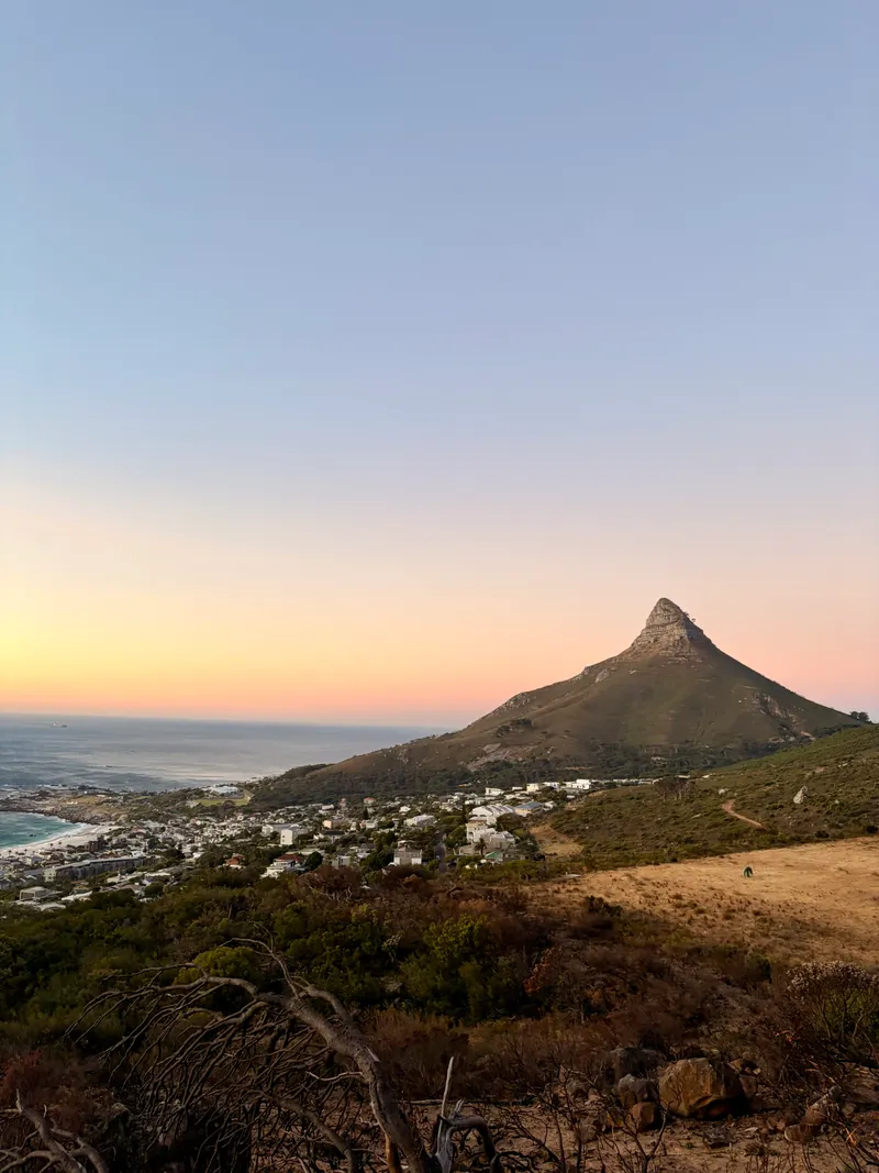 📍 Lion’s Head, Cape Town · Sunset over Camps Bay