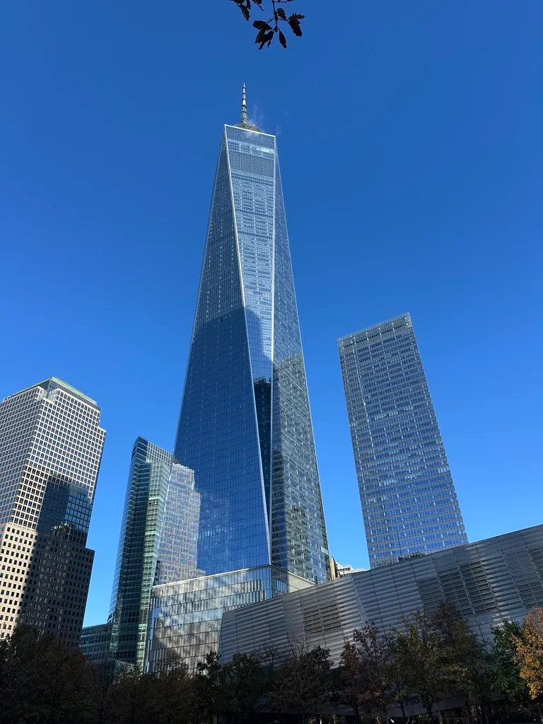 📍 One World Trade Center, New York · Looking up from the memorial